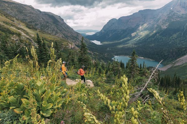 Couple hiking in Glacier National Park 1274394270