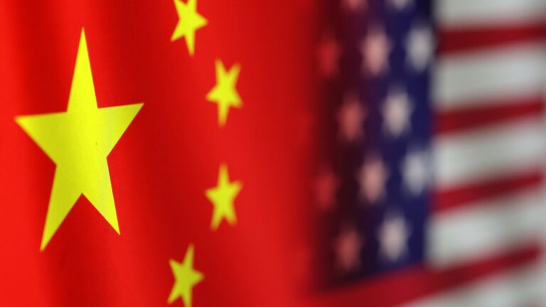 illustration shows u s and chinese flags